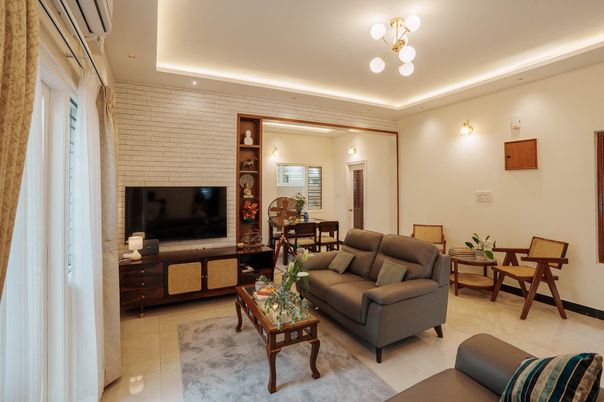 Nektar Home Amruth 2BHK — warm, inviting living room